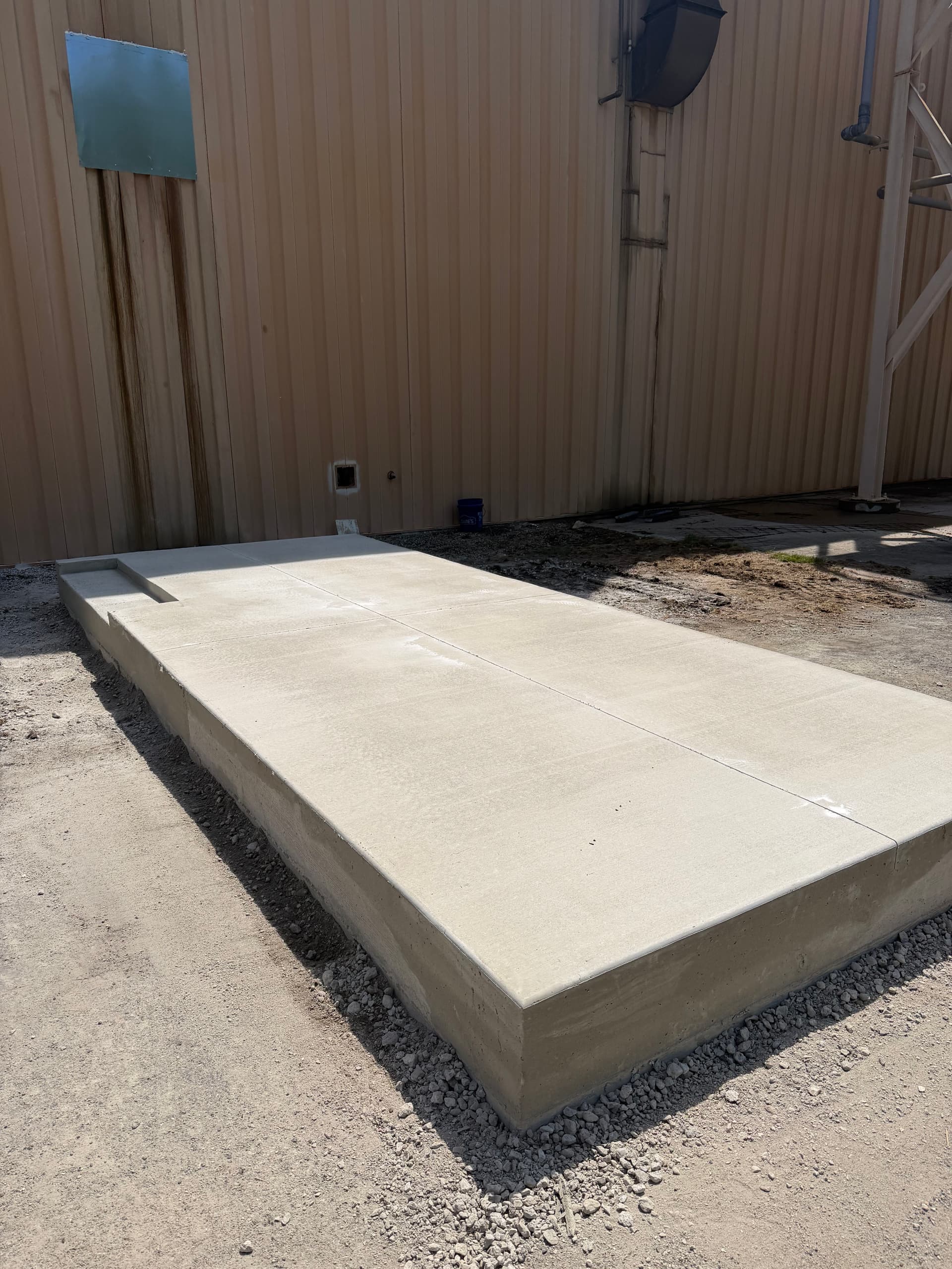 Concrete Equipment Pad Poured and Finished for Air Cleaner Unit image