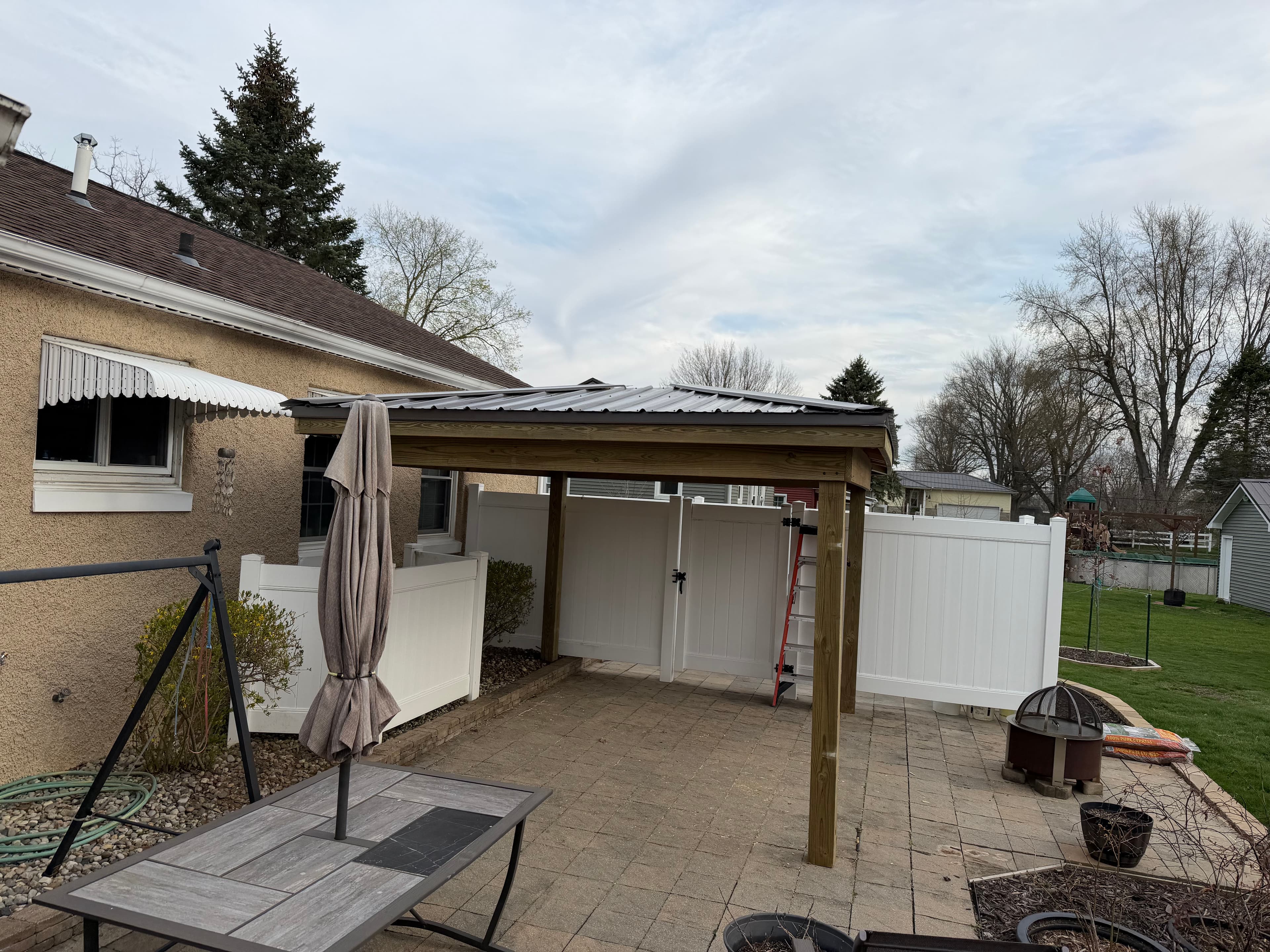 Project Covered Patio Build Adds Outdoor Living Space in Auburn Indiana image